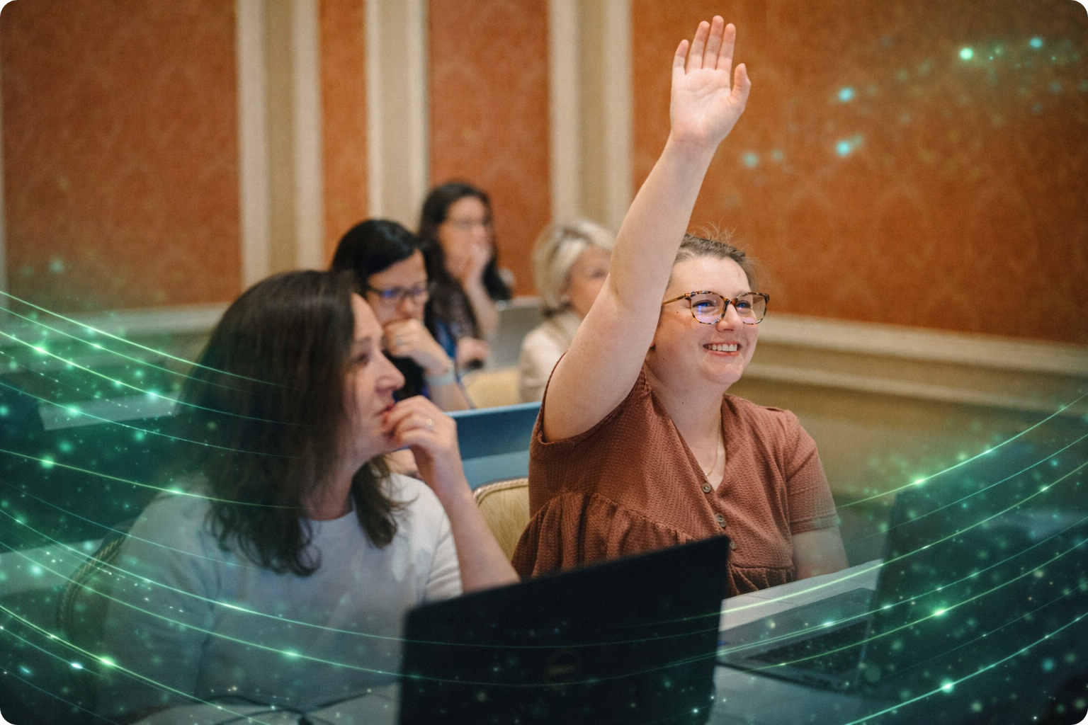Our Commitment Client Raising hand in a working Summit Session