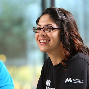 A smiling young female student