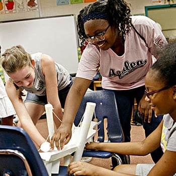 Students working on a science project 