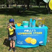 Photo of child at lemonade stand - SmartSimple platform makes an impact on SickKids Foundation