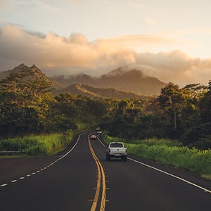 Highway traffic in a mountainous landscape