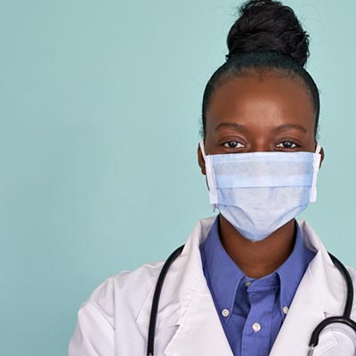 A physician with face mask