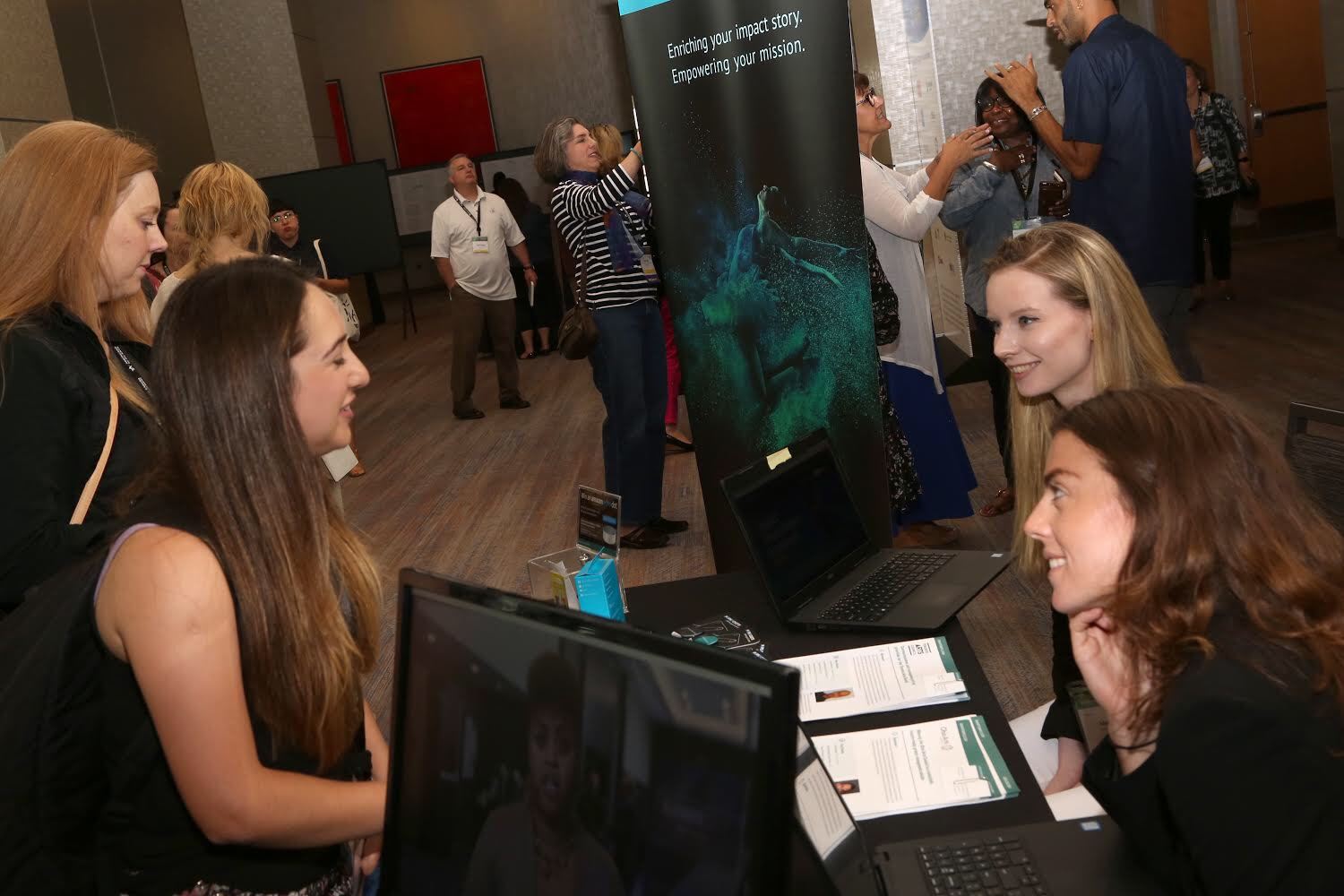 SmartSimple Business Analyst, Megan Keogh and SmartSimple Project Coordinator, Sinead McInerney connecting with AFTACON Attendees. Photo by Sylvain Gaboury