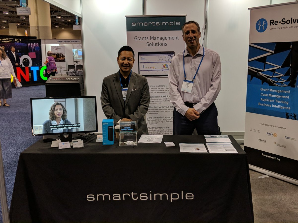 SmartSimple's Director of Marketing, Alex Wong and Re-Solved's CEO, Joshua Sugar at Rotary International's 2018 Conference in Toronto. 