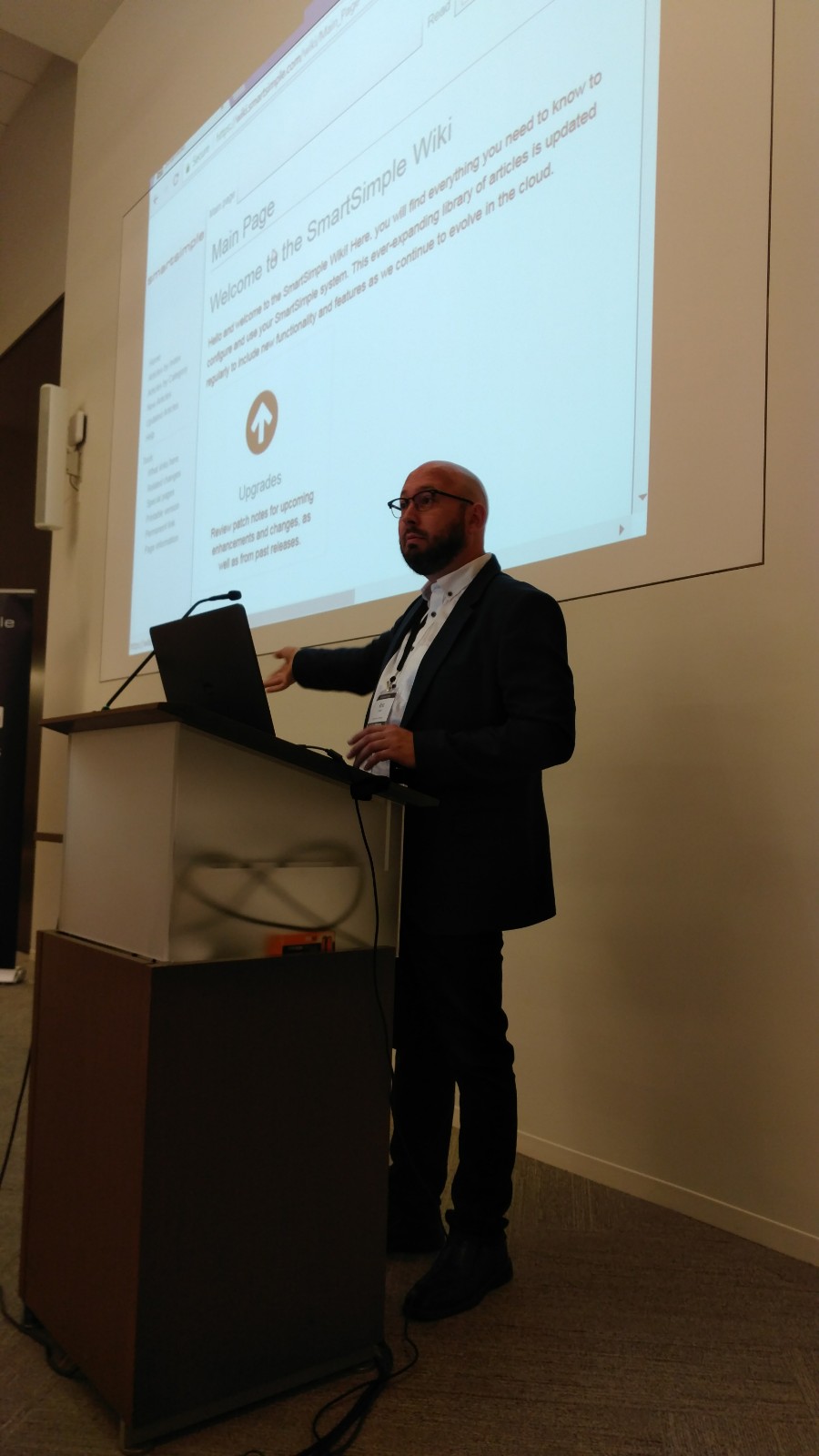 SmartSimple's Co-Founder & Director, Customer Experience presenting system upgrades at the event. Photo by Todd Lapin, Director of Strategic Accounts