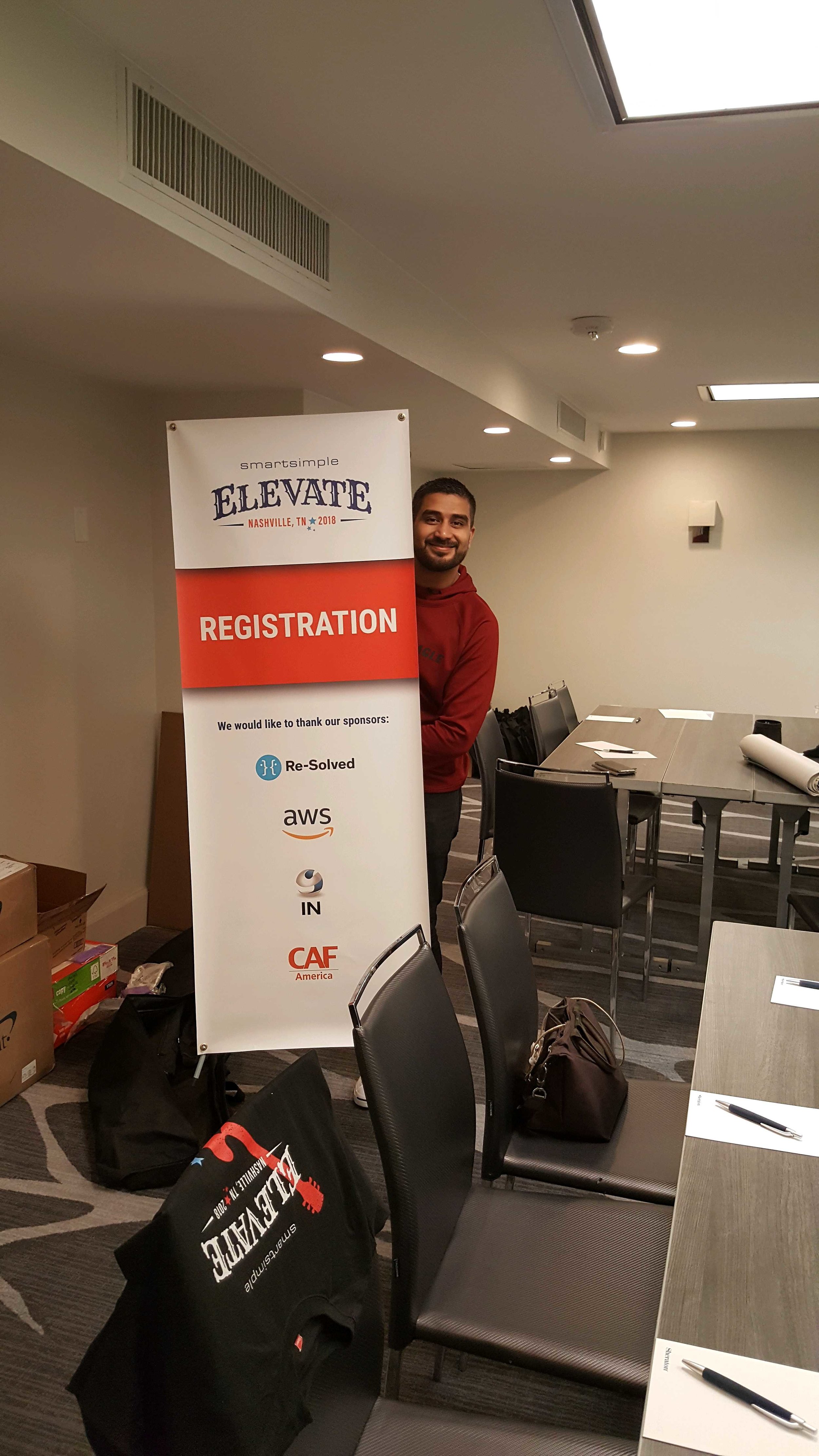 SmartSimple’s Team Lead of Technical Community Support, Arjun Hiranandani, setting up for Elevate